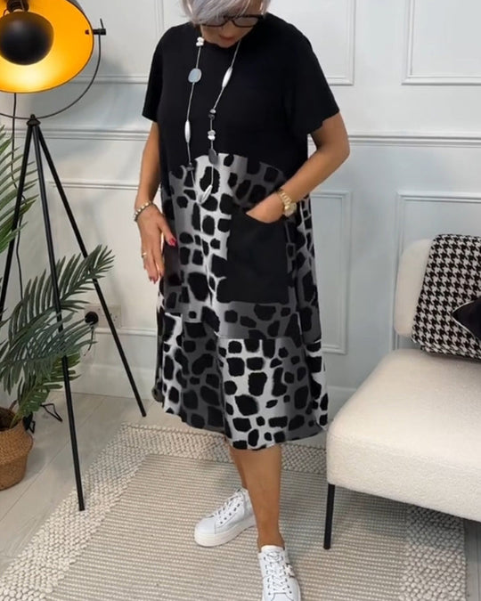 Elina | Lyhythihainen mekko pyöreällä pääntiellä ja printillä